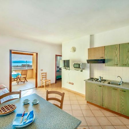 Air Borgo Della Torre Aparthotel Isola Rossa Bagian luar foto