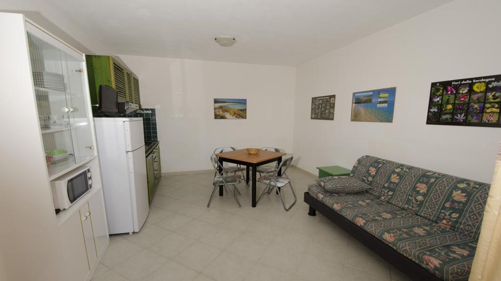 Air Borgo Della Torre Aparthotel Isola Rossa Bagian luar foto