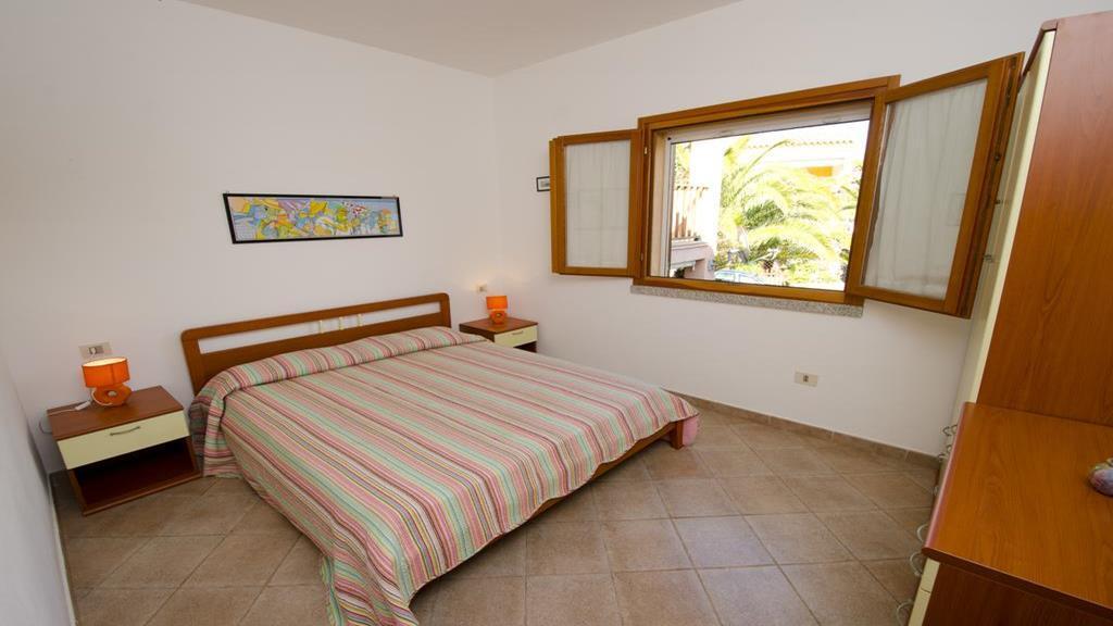 Air Borgo Della Torre Aparthotel Isola Rossa Bagian luar foto