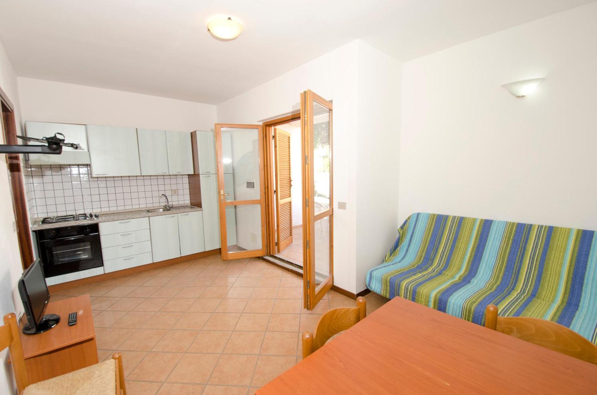 Air Borgo Della Torre Aparthotel Isola Rossa Bagian luar foto