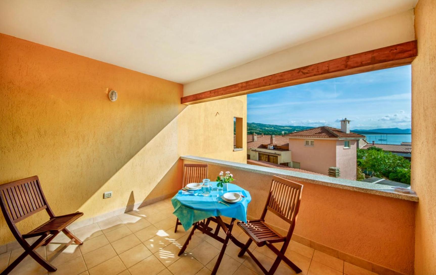 Air Borgo Della Torre Aparthotel Isola Rossa Bagian luar foto