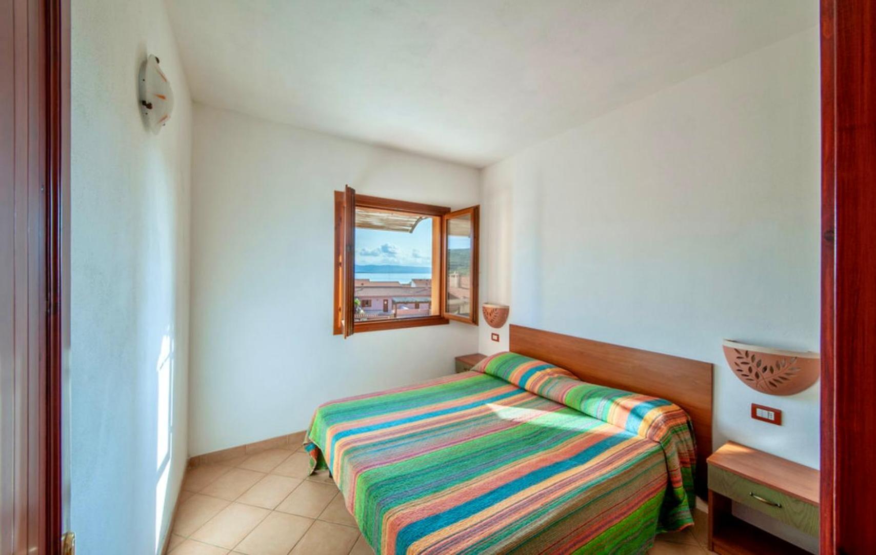 Air Borgo Della Torre Aparthotel Isola Rossa Bagian luar foto