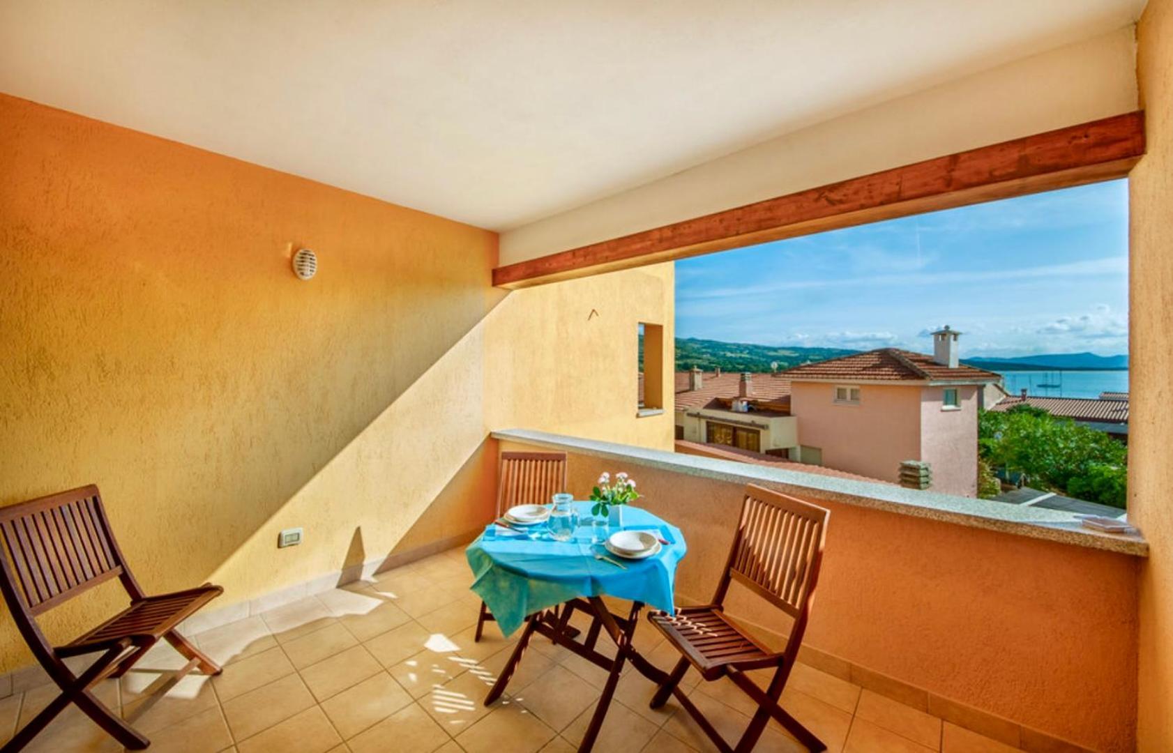 Air Borgo Della Torre Aparthotel Isola Rossa Bagian luar foto