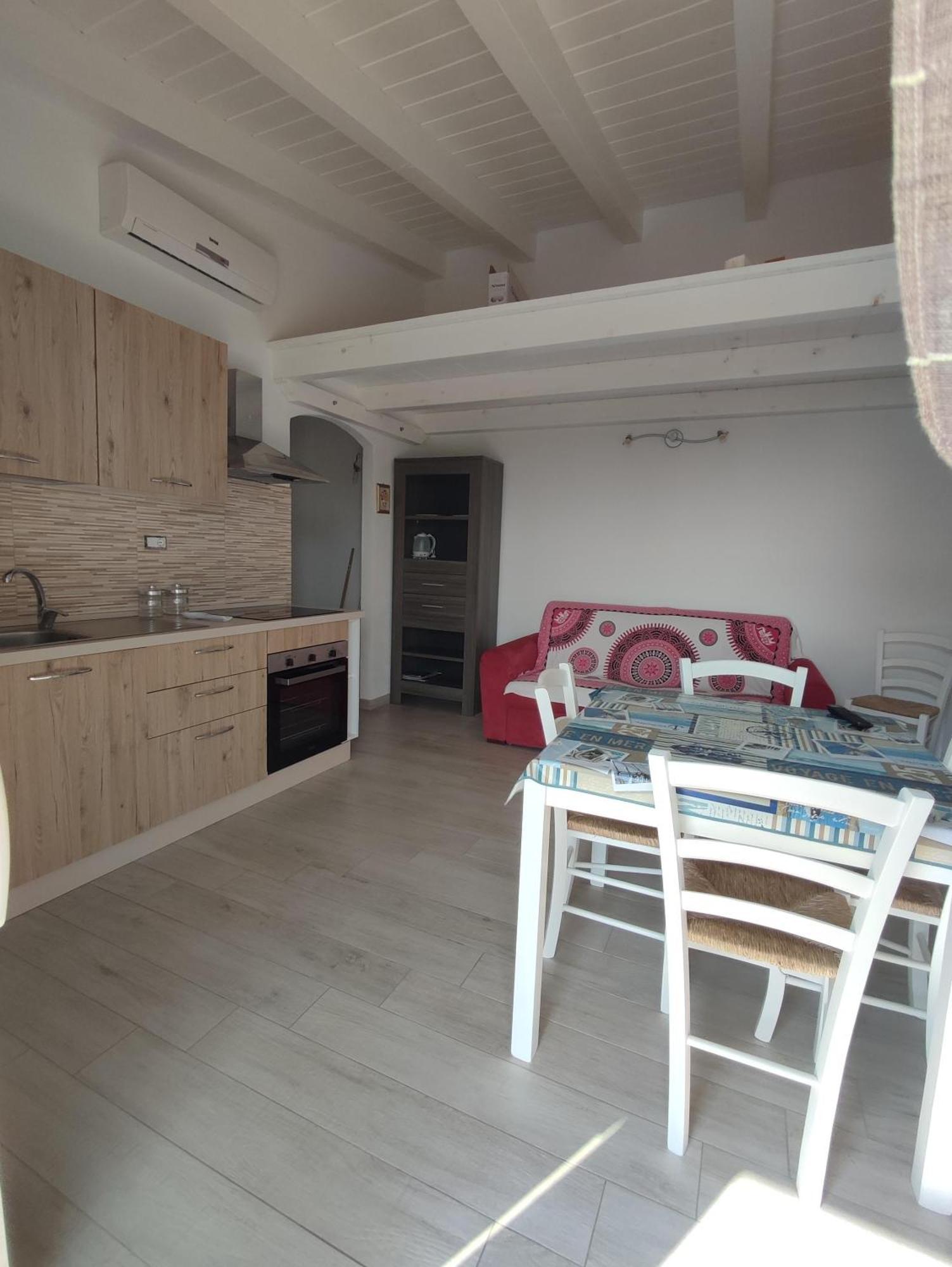 Air Borgo Della Torre Aparthotel Isola Rossa Bagian luar foto