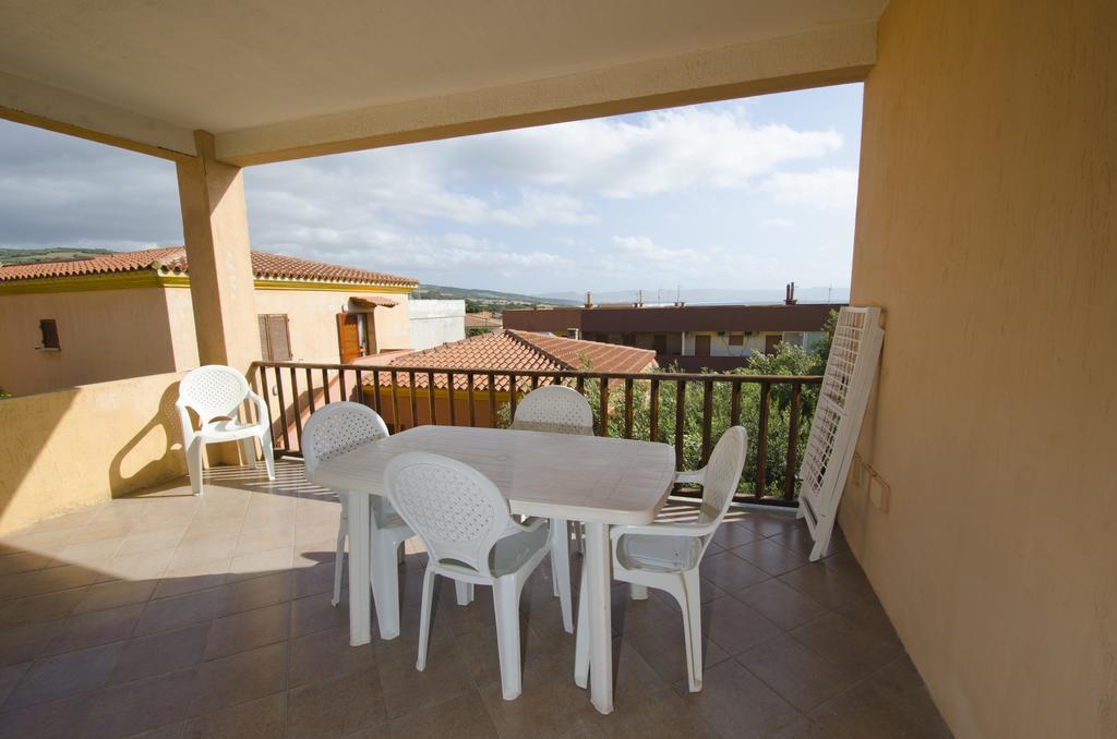 Air Borgo Della Torre Aparthotel Isola Rossa Bagian luar foto
