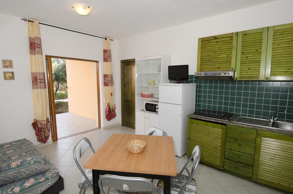Air Borgo Della Torre Aparthotel Isola Rossa Bagian luar foto