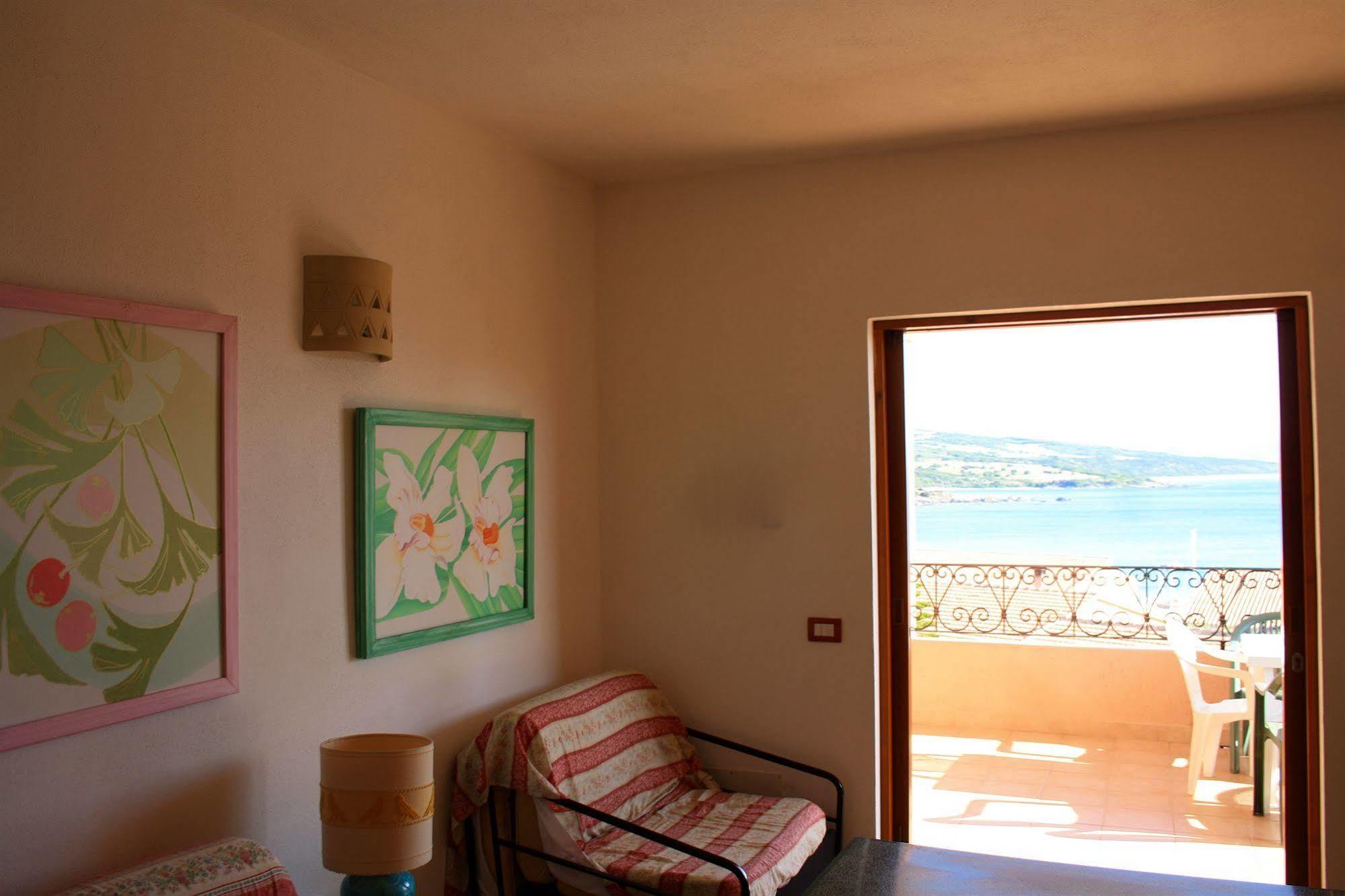 Air Borgo Della Torre Aparthotel Isola Rossa Bagian luar foto