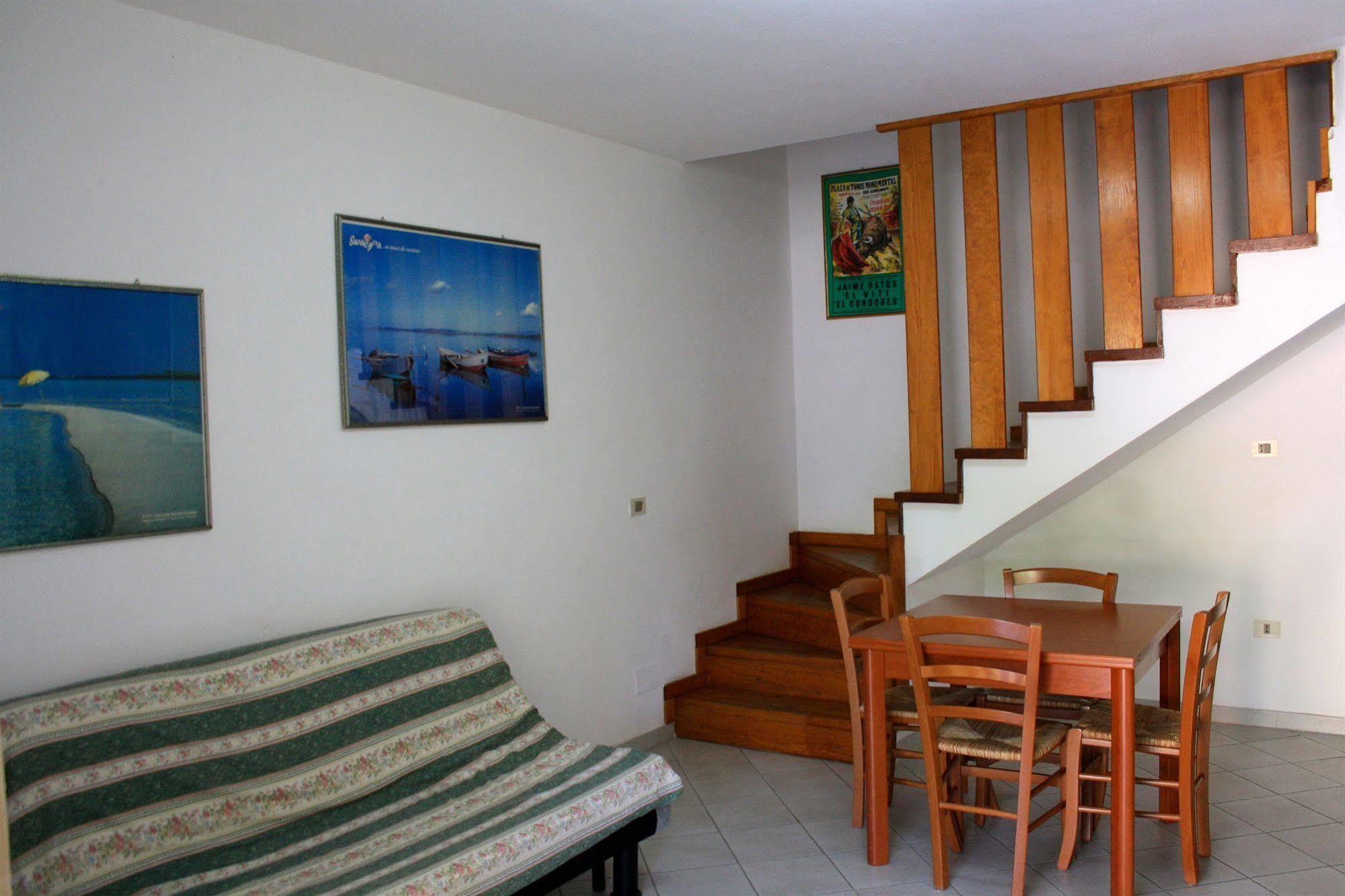 Air Borgo Della Torre Aparthotel Isola Rossa Bagian luar foto