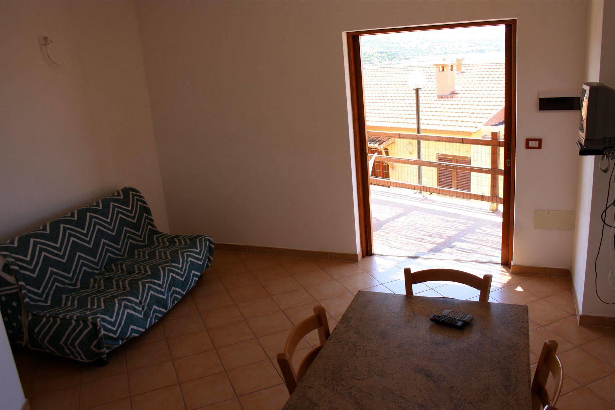 Air Borgo Della Torre Aparthotel Isola Rossa Bagian luar foto