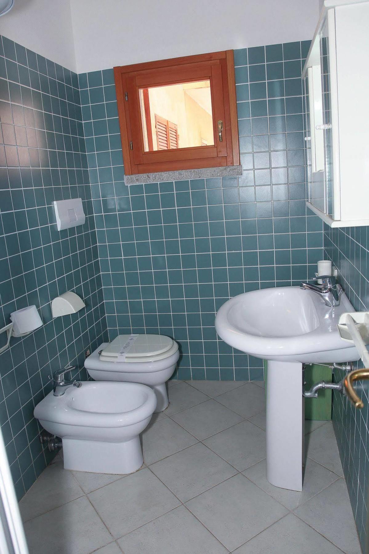 Air Borgo Della Torre Aparthotel Isola Rossa Bagian luar foto