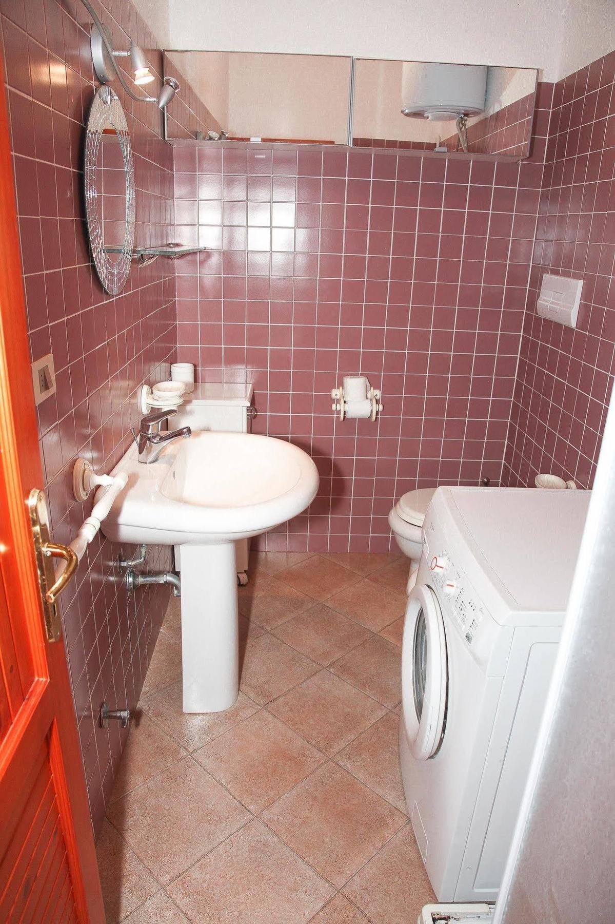 Air Borgo Della Torre Aparthotel Isola Rossa Bagian luar foto