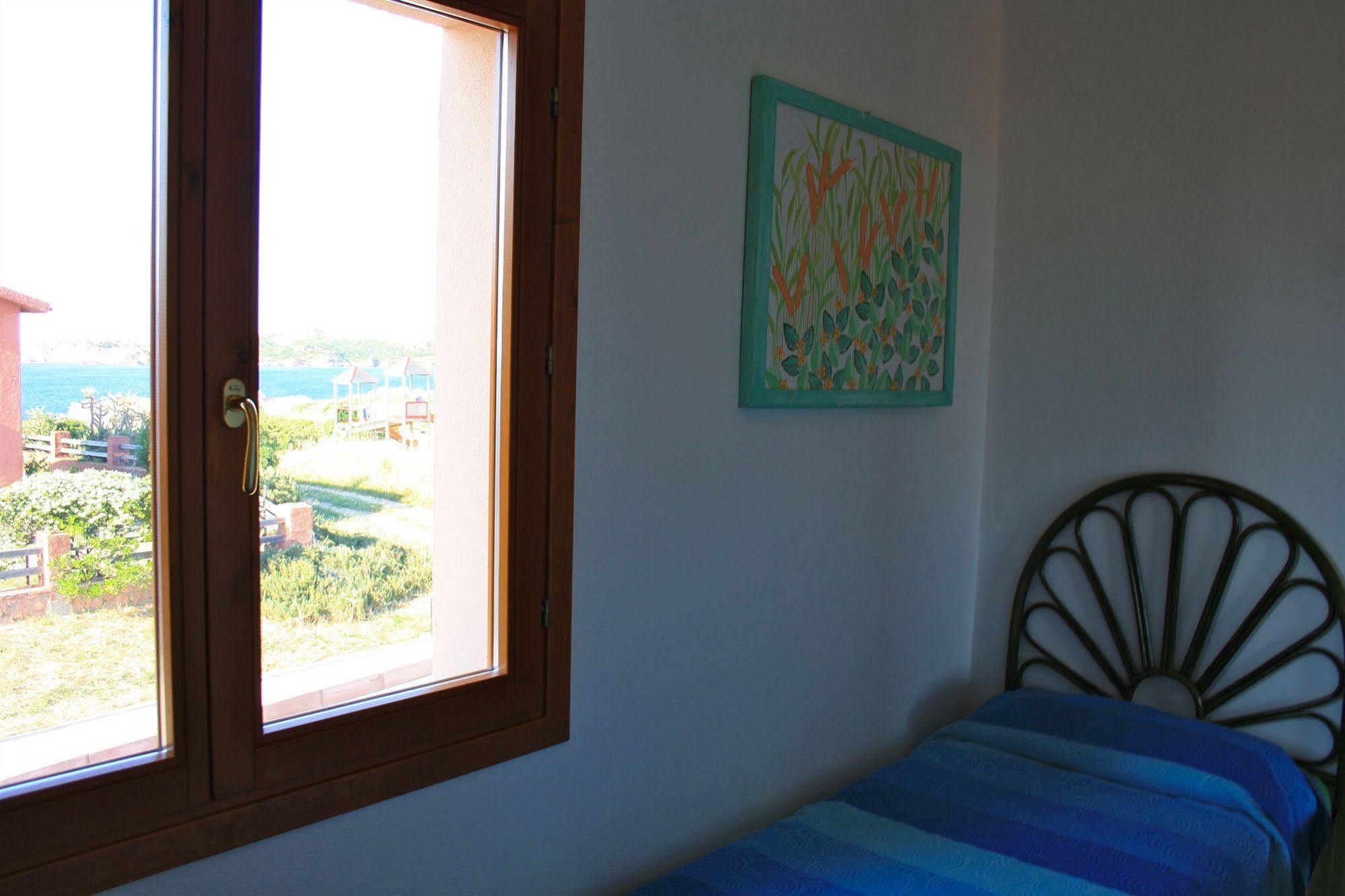 Air Borgo Della Torre Aparthotel Isola Rossa Bagian luar foto