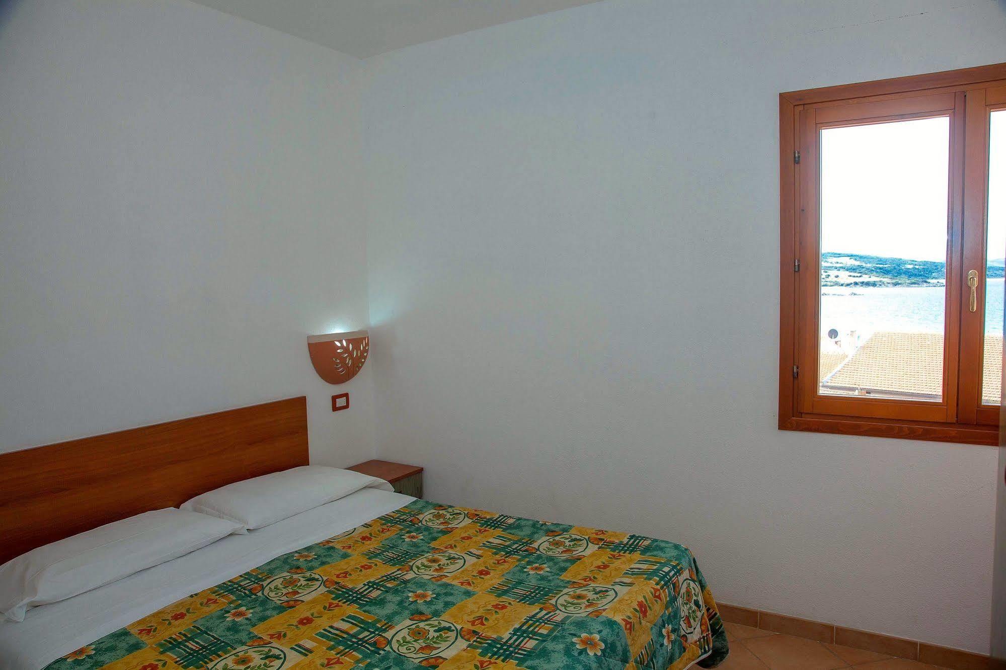 Air Borgo Della Torre Aparthotel Isola Rossa Bagian luar foto