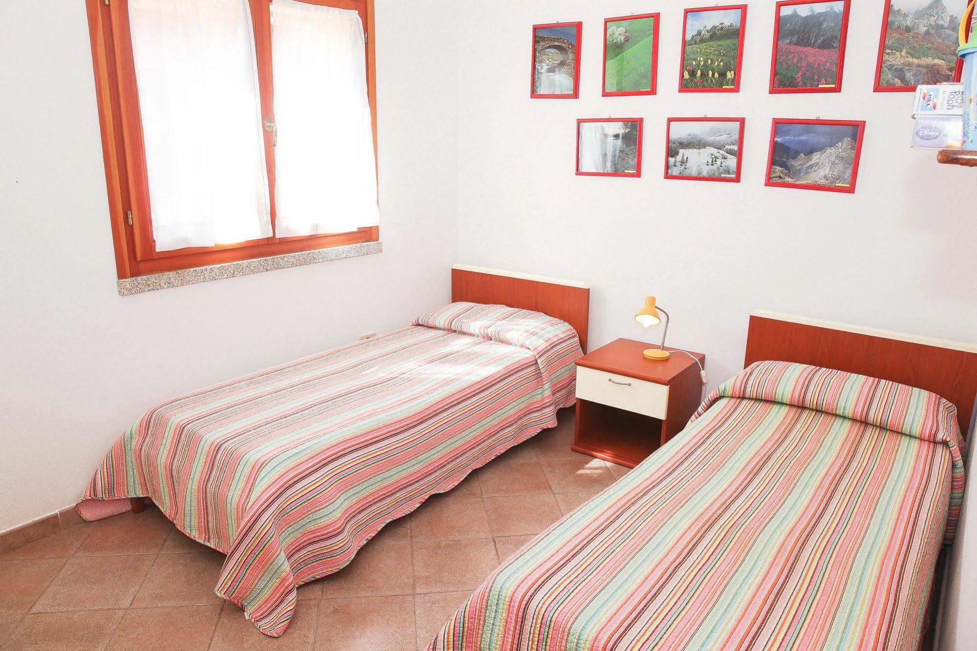 Air Borgo Della Torre Aparthotel Isola Rossa Bagian luar foto