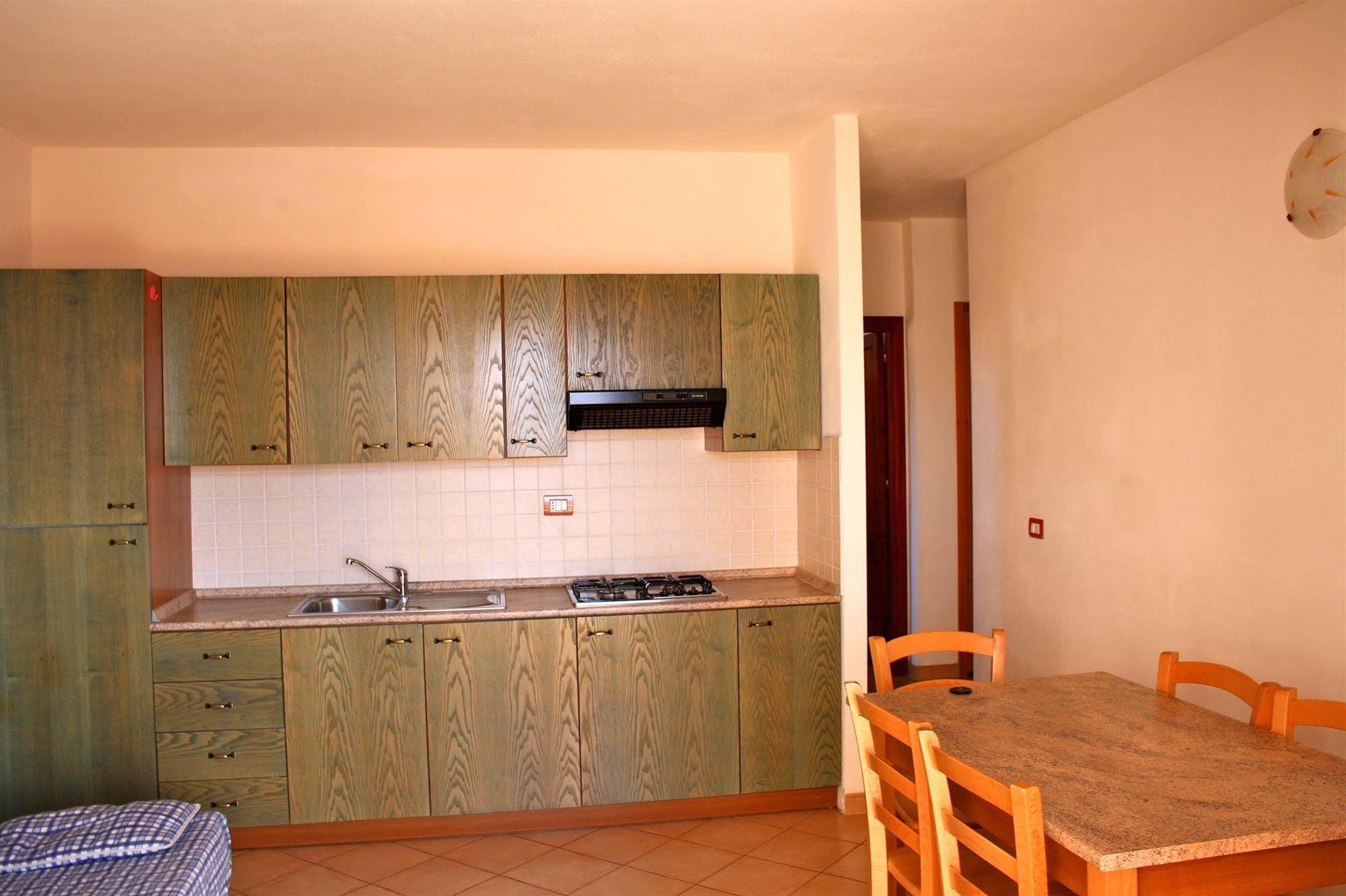 Air Borgo Della Torre Aparthotel Isola Rossa Bagian luar foto