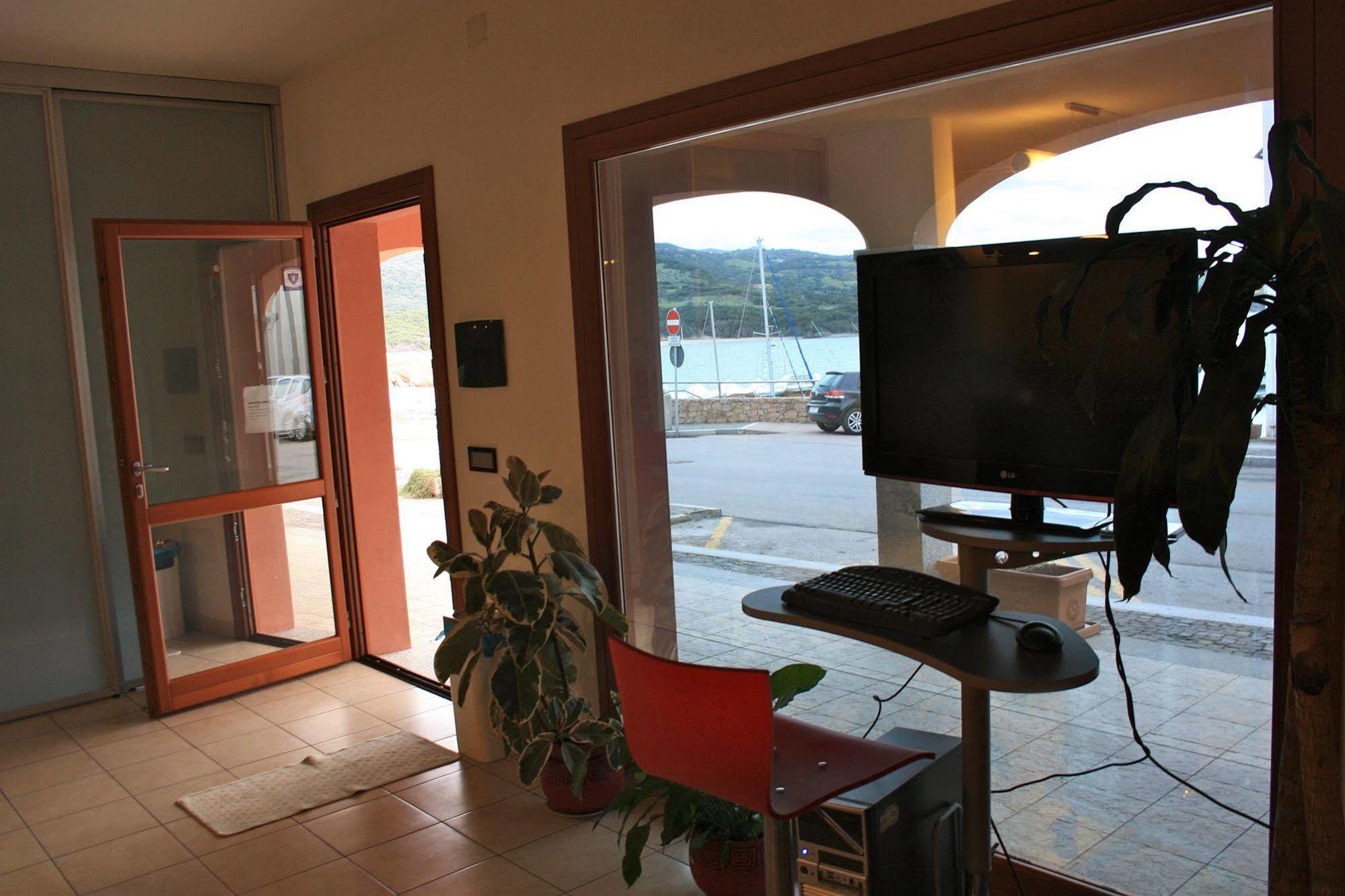 Air Borgo Della Torre Aparthotel Isola Rossa Bagian luar foto